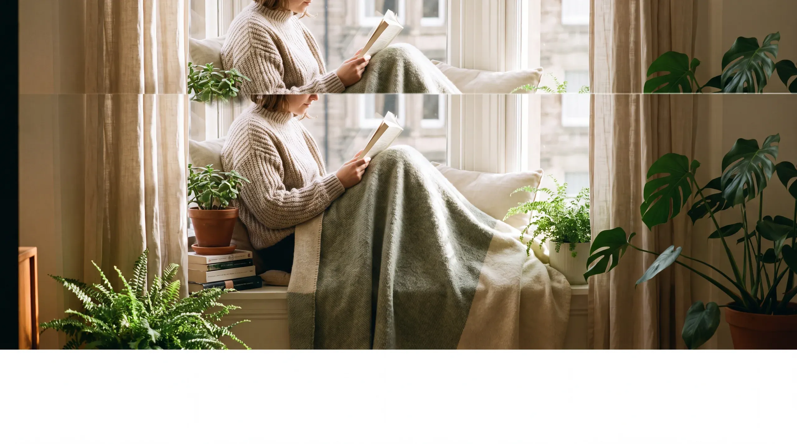 Una persona lee tranquila en un rincón acogedor y luminoso, con plantas.